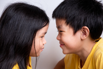 positive emotion of children, happiness, smiling, laughing, enjoy on white background. lovely relationship of brother and sister. portrait of children's feeling