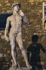 Fototapeta na wymiar Famous Michelangleo´s David sculpture in front of Vecchio Palace