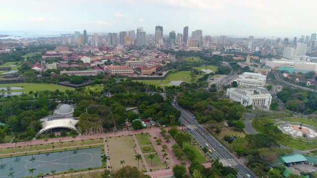 Aerial Establishing Shot Of Binondo City From Luneta Park Vantage Point