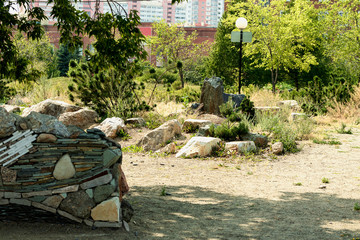 A beautiful landscape consisting of stones and green spaces.
