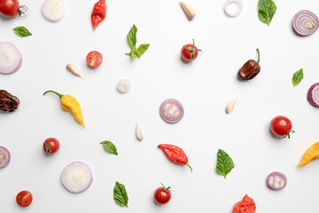 Flat lay design of vegetable, herb and spice on white background.