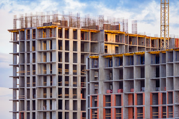 Multi-storey building under construction. Apartments for sale in new buildings. Housing construction. Modern construction technologies.