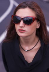 Naklejka premium Portrait of a girl tourist on the streets of St. Petersburg