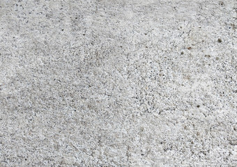 Cement texture on unpainted wall.