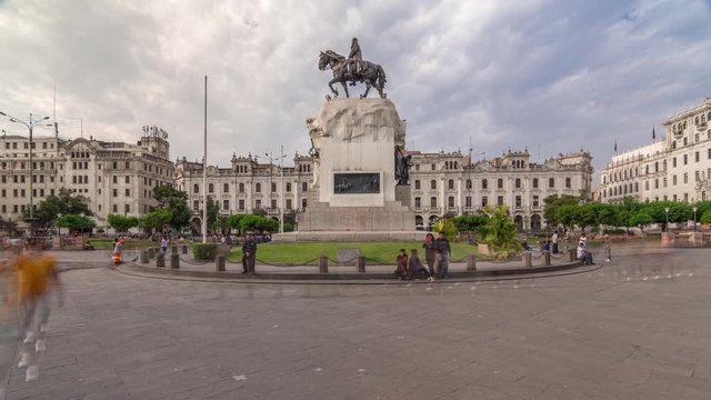 Monument to Jose de San Martin on the Plaza San Martin timelapse hyperlapse in Lima, Peru. Cloudy sky and historic buildings on a background