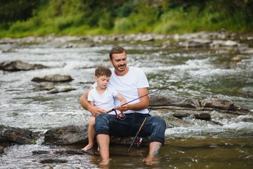 Father and son together fishing