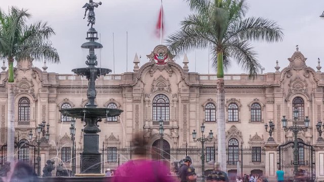 Fountain on The Plaza de Armas timelapse, also known as the Plaza Mayor, sits at the heart of Lima's historic center. Goverment palace on a background