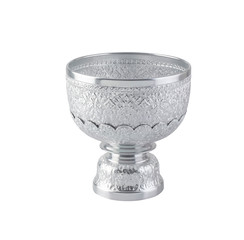 Silver color water bowl with stand in Thai style used in religious ceremonies isolated on white