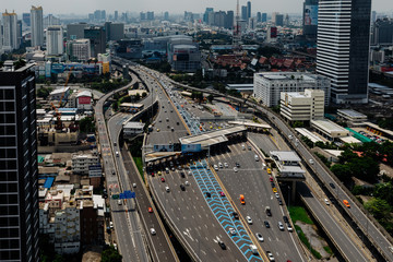 BANGKOK, THAILAND - JULY 22 2020 : Expressway tollgate, Cars at gate toll payment on expressway,  in Thailand.