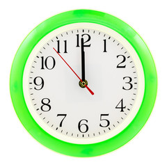 Green clock on white isolated background, which shows 12 hours. The New Year has come
