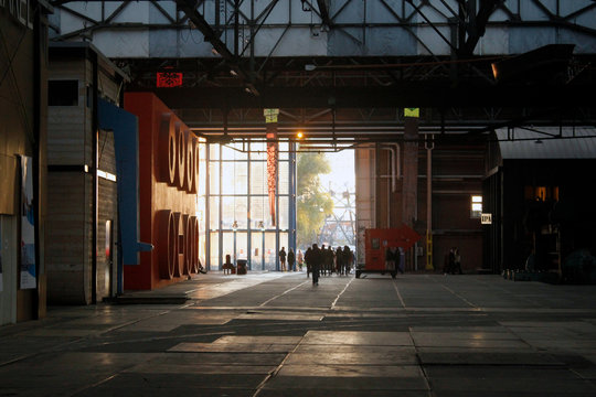 People walking out of NDSM yard in Amsterdam