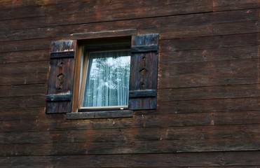 Wooden windows on an old house Tyrol Austria