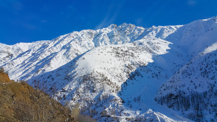 snow covered mountains in winter