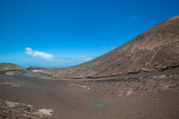 Fototapeta na wymiar volcanic rock landscape in Timanfaya in Lanzarote