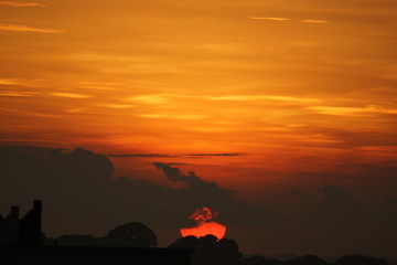 Fototapeta na wymiar Rising Sun looking like hot ball of fire