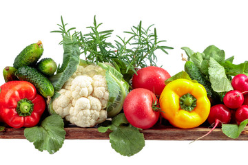 Various fresh raw vegetables isolated on white background.