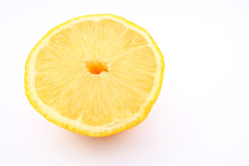 Lemon fruit cut in half in close-up. Food for vegetarian or vegan. Frame for text.