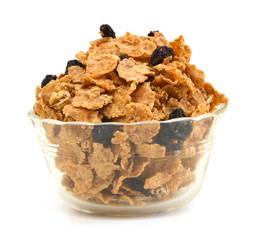 bran and raisin cereal in a bowl , top view
