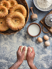 Baker knead dough for uzbek bread