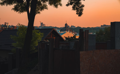 back street Eastern Europe ghetto district shadow with landmark urban view on historical city...