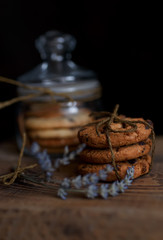 Fototapeta na wymiar coffee grinder with coffee beans on wooden background