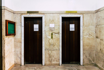 Elevators in the lobby of the old hotel