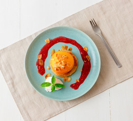 Roasted peaches with lemon, lime and basil creme fraiche and raspberry coulis. Tasty sweet fruit...
