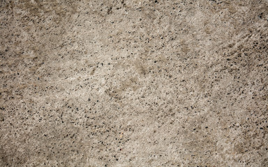 Horizontal background textured of stone wall, copyspace ready for design, wallpaper, advertising. Surface of cement, house wall in close up, macro . Old-fashioned style, decorative.
