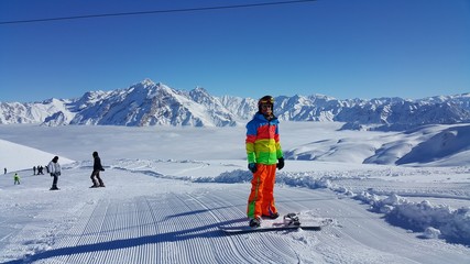 young skier skiing on the mountain and winter season, snow sale, ski resort
