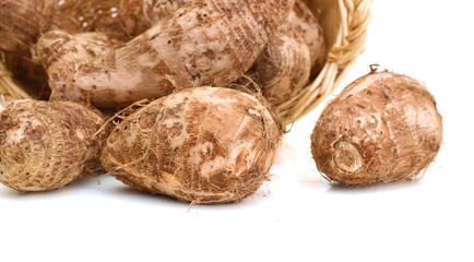Taro in basket on white background