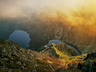 Sunrise over the lakes in the Polish Tatras. Photo taken from the peak of Kazalnica Tatry