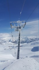 a pole in the snowy mountains
