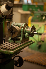 vintage lathe at the factory, turning production