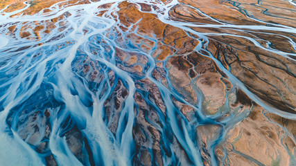 A glacial rivers from above. Aerial photograph of the river streams from Icelandic glaciers....