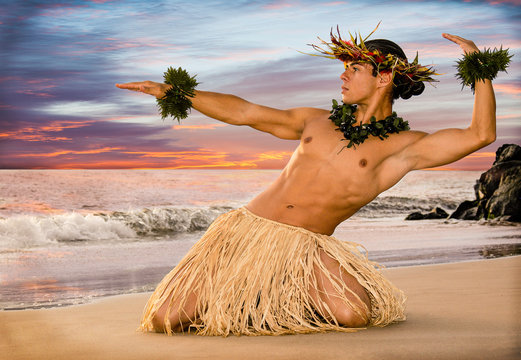 Handsome Male Hula Dancer on the beach at sunset in traditional costume.   - Powered by Adobe