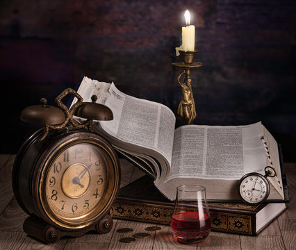 Still life photography of a vintage reading ambiance, that simulates a certain feel backdated for a century ago .