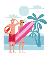 young couple wearing swimsuits with surfboard and balloon on the beach scene