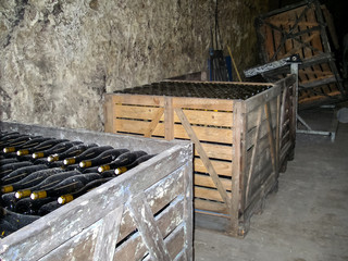Wine cellar with bottles of wine from a French winemaker.
