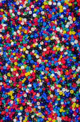 Fototapeta na wymiar many beads of different colors