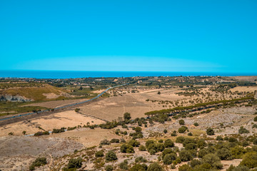 Landscapes with dry fields and farmlands on the southern coast of Sicily near Agrigento