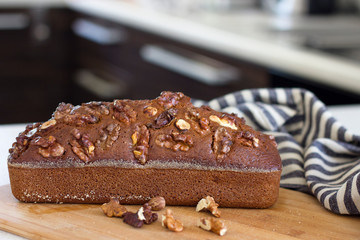 Homemade banana bread on a wood background selective focus