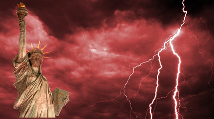 The statue of Liberty on the background of a stormy sky. Problems Of The United States Of America....