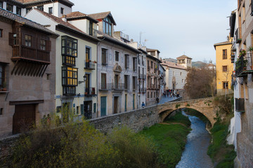 Fototapeta na wymiar The River Darro, Carrera del Darro and the Espinosa Bridge, El Albaicin, Granada, Spain