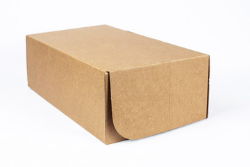 Cardboard box is closed for storage, transportation of shoes, various things on a white background
