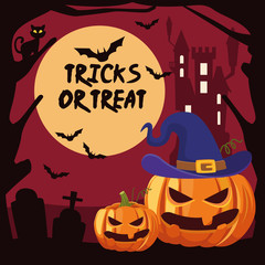 halloween tricks or treat lettering with pumpkis in cemetery
