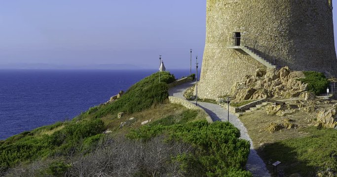Italy, Sardinia, Northern Sardinia, Santa Teresa di Gallura, Torre di Longonsardo tower. In the background you can see the coasts of Corsica, France 4K