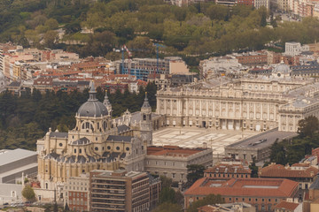 Fototapeta na wymiar Aerial view of Royal Palace and Almudena Cathedral in Madrid. Travel, tourism, famous place.