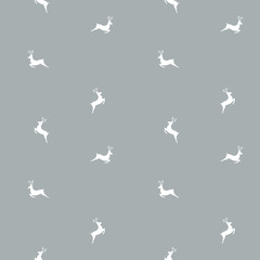 Christmas seamless pattern with reindeer on gray background. Vector illustration.