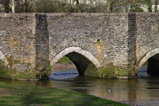 A bridge with several arches over the river Fowey at Lostwithiel