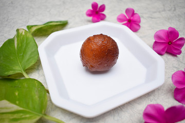Gulab jamun a dessert often eaten at festivals, celebrations in Indian subcontinent. Single piece...